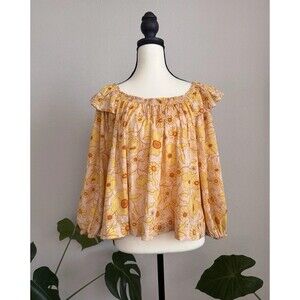 Top manches bouffantes à pois rose